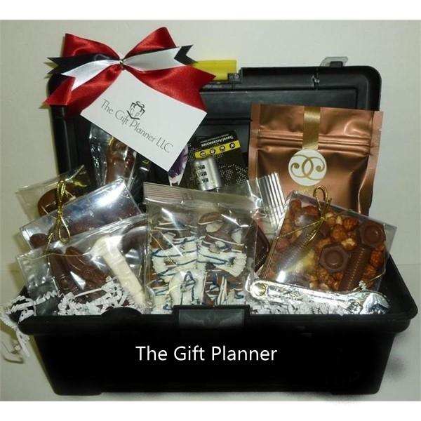 Black Plastic toolbox filled with gourmet food and snacks. An industry themed gift basket filled with chocolate tools, chocolate covered pretzels, chocolate bolts and nuts and other gourmet items perfect for any contractor or construction company!
